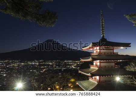 Mount Fuji and Chureito Pagoda at night in autumn, Japan. The Pagoda is in Arakura Sengen Shrine one of the most famous tourist attraction where tourist can see Mt Fuji from panoramic view