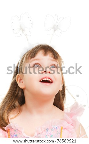 surprised little girl looking up, isolated on white