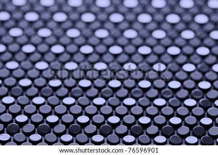 Black pimply surface. Useful as abstract background. Royalty-Free Stock Photo #76596901