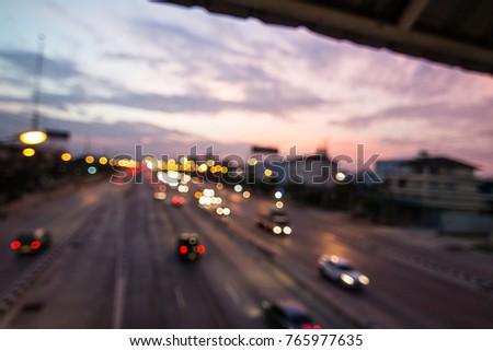 defocused cityscape show with building and traffic when twilight sky