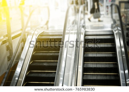 The escalator in the shopping mall.Got way up and down.