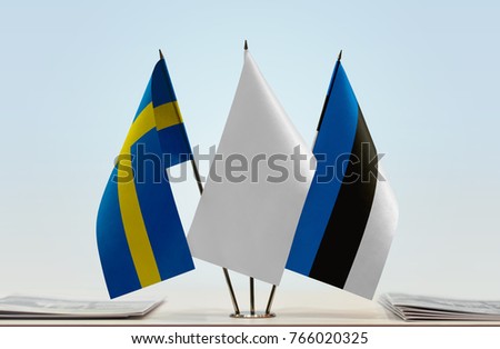 Flags of Sweden and Estonia with a white flag in the middle