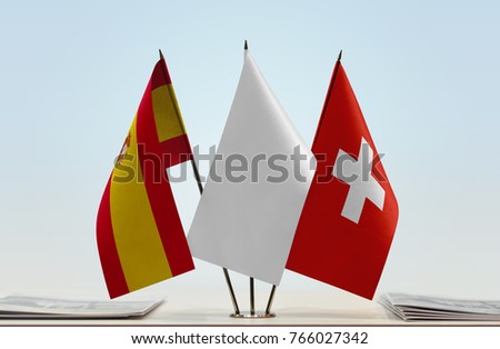 Flags of Spain and Switzerland with a white flag in the middle