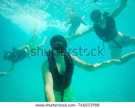 diving family having fun