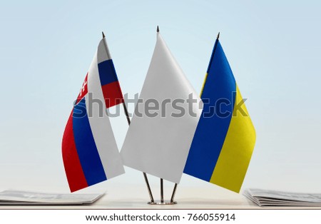 Flags of Slovakia and Ukraine with a white flag in the middle
