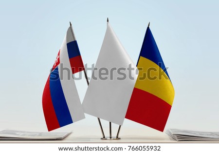 Flags of Slovakia and Romania with a white flag in the middle
