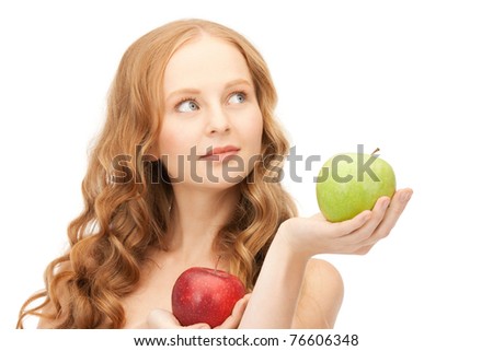 picture of young beautiful woman with green and red apples