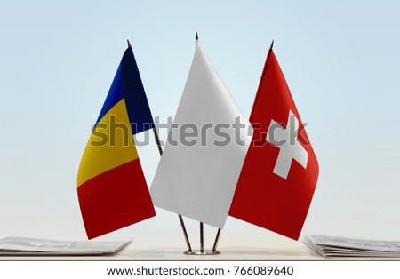 Flags of Romania and Switzerland with a white flag in the middle