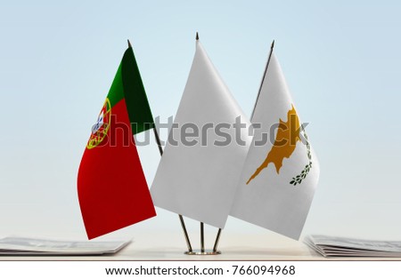 Flags of Portugal and Cyprus with a white flag in the middle