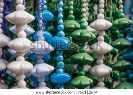 Cheap stone beads of different colors, background