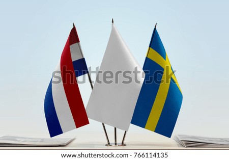 Flags of Netherlands and Sweden with a white flag in the middle