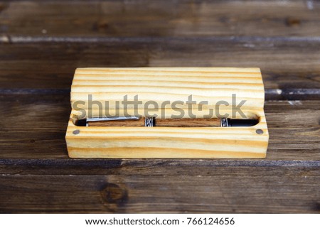 fountain pen made of wood in a wooden case