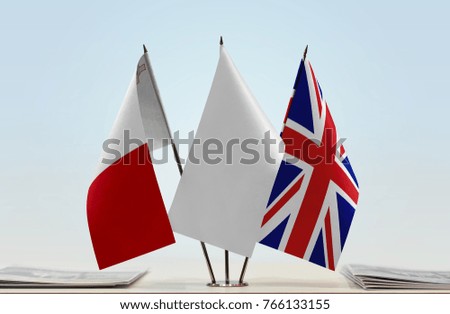 Flags of Malta and United Kingdom with a white flag in the middle