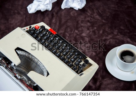 the typewriter and coffee, view from above