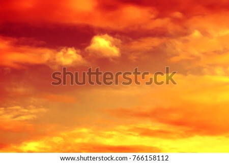 yellow red fiery cloudy sky Royalty-Free Stock Photo #766158112
