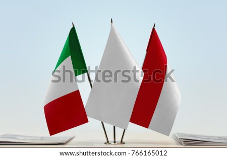 Flags of Italy and Monaco with a white flag in the middle