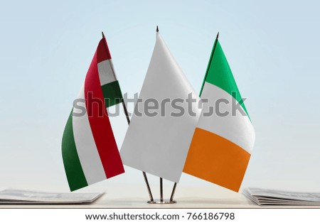 Flags of Hungary and Ireland with a white flag in the middle