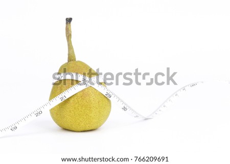 Pear with tape measure isolated on white background.