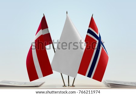 Flags of Denmark and Norway with a white flag in the middle