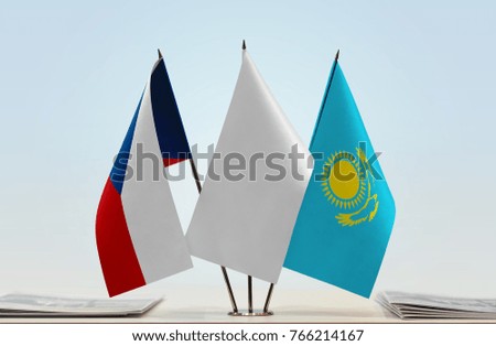 Flags of Czech Republic and Kazakhstan with a white flag in the middle
