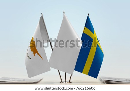 Flags of Cyprus and Sweden with a white flag in the middle