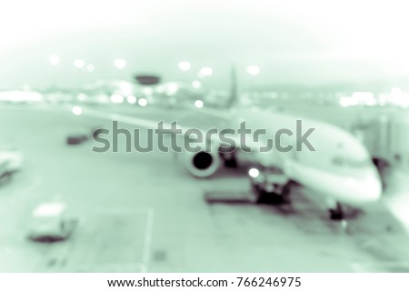 Abstract blur airport interior for background at Hong Kong with green tone 