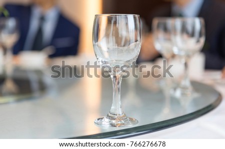 An empty red wine cup on the table