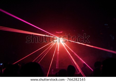 Lights show. Lazer show. Night club dj party people enjoy of music dancing sound with colorful light. club night light dj party club. With Smoke Machine and lights. 