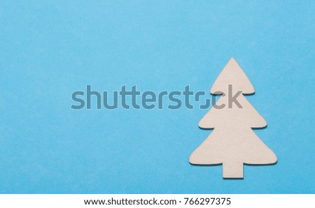Christmas tree lay flat on blue background