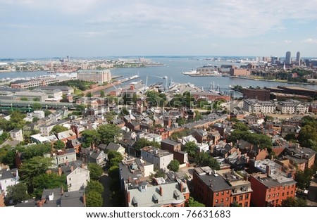 Boston Inner Harbor. Boston waterfront skyline and Logan International Airport, viewed from Bunker Hill Monument, Charlestown, Massachusetts