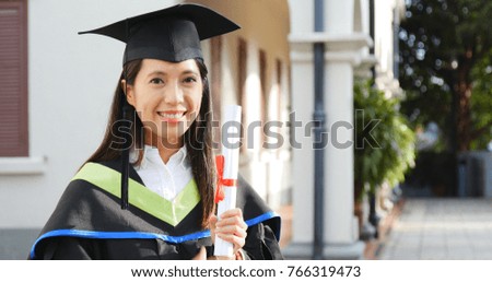 Excited woman get graduation