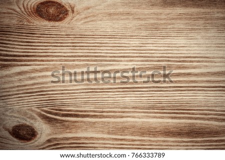 Brown wooden background. Top view. Textured closeup photo