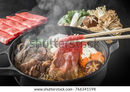 Sukiyaki in the marbled Japanese beef Royalty-Free Stock Photo #766341598