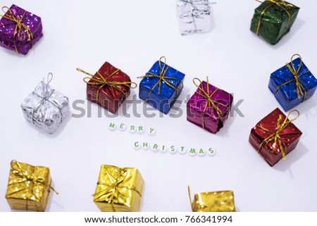 Merry Christmas decorations. Small presents on white backgrounds.