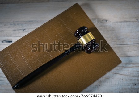  Golden scales of justice, gavel and books on brown background, Law code