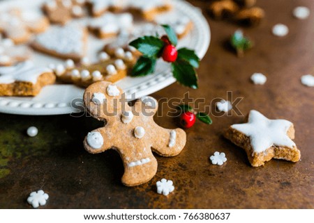 Homemade Christmas gingerbread cookies on vintage background. 