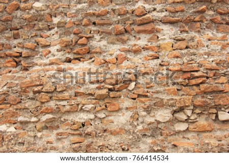 Old Wall of Red Bricks and White Brayed and Cracked Old Paint. Red, Terracotta and White Brick Background. Old Wall for Background, Design, Design and Template.