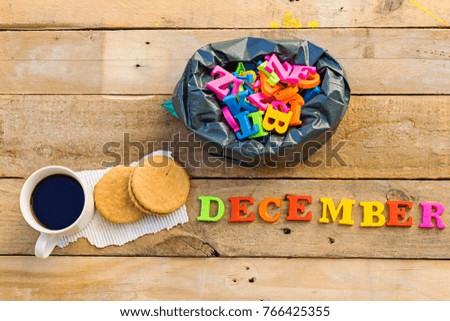 hello december with colorful letters and drinking arabic coffee