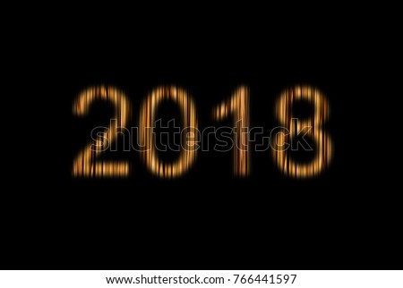 Symbol of the new year of Christmas 2018, glowing beige yellow figures two thousand and eighteen, the wood texture carved black background