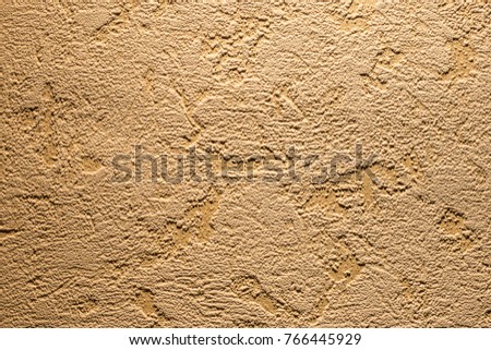 Wallpaper texture closeup background in light yellow color. . Wall  varnish decorated in home modern style.