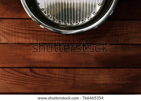 Big Silver frying pan on the table background