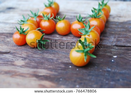 bunch of tiny tomatoes 