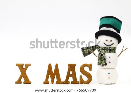 Winter concept with Snowman and text X MAS, isolated on white background. Snowman dressed with green plaid scarf, green and black knitting hat. For decoration of christmas and happy new year greeting