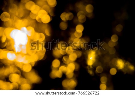 Light bokeh of traffic in dark night. Bokeh is aesthetic quality of blur produced out of focus parts of an image produced by a lens. Way the lens renders out-of-focus points of light is Bokeh.