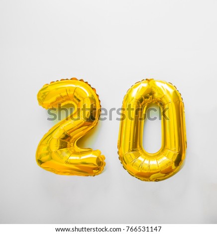 Golden number 20 twenty golden metallic balloon. Party decoration golden balloons. Anniversary sign for happy holiday, celebration, birthday, carnival, new year. Metallic design balloon