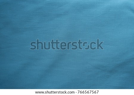 Bright blue thin cotton fabric from above