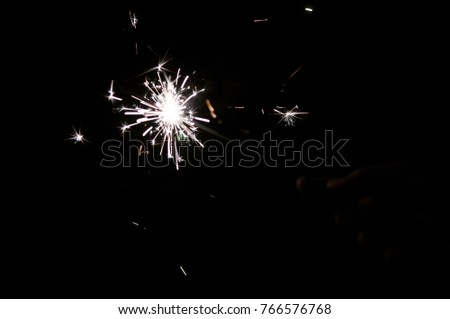 Close-Up Of Sparkler At Night. Macro of Sparkler illuminated at night in private party