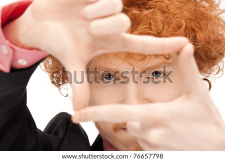 picture of handsome man creating a frame with fingers