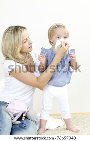 mother with a sniffing daughter Royalty-Free Stock Photo #76659340