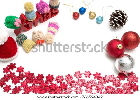 X-mas text and  pine cone, ball, fur hat, red snow flower decoration on white background